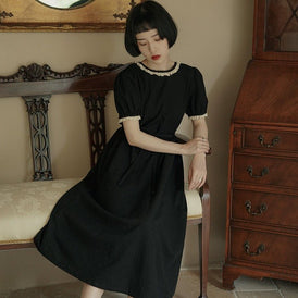 Back bow hollowed-out short-sleeved lantern-sleeved little black dress - MEIMMEIM(メイムメイム)